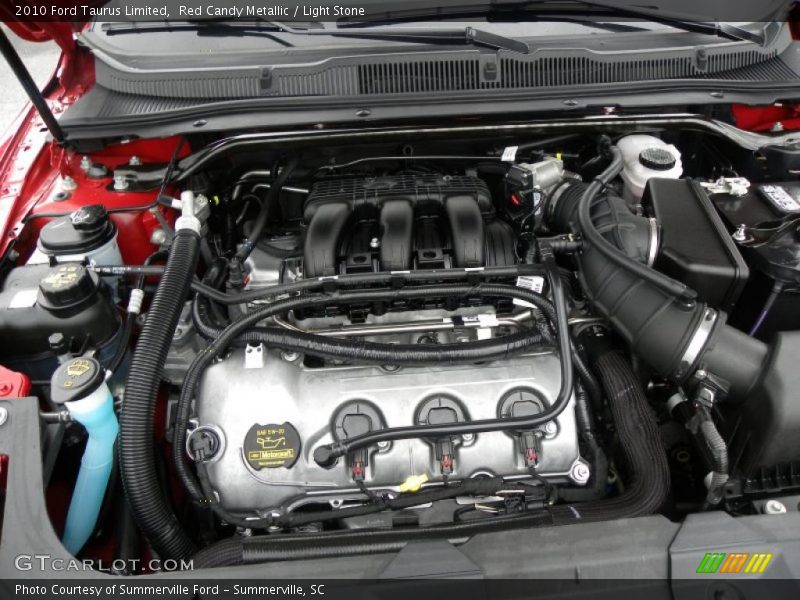 Red Candy Metallic / Light Stone 2010 Ford Taurus Limited