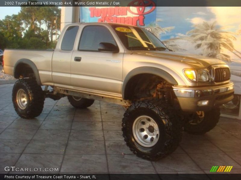 Mystic Gold Metallic / Oak 2002 Toyota Tacoma V6 Xtracab 4x4