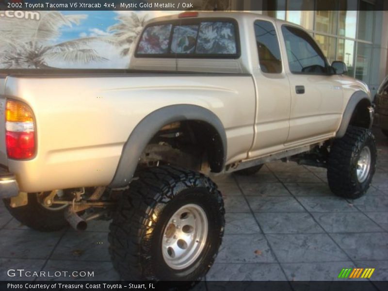 Mystic Gold Metallic / Oak 2002 Toyota Tacoma V6 Xtracab 4x4