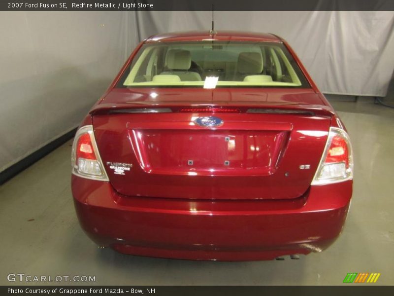Redfire Metallic / Light Stone 2007 Ford Fusion SE