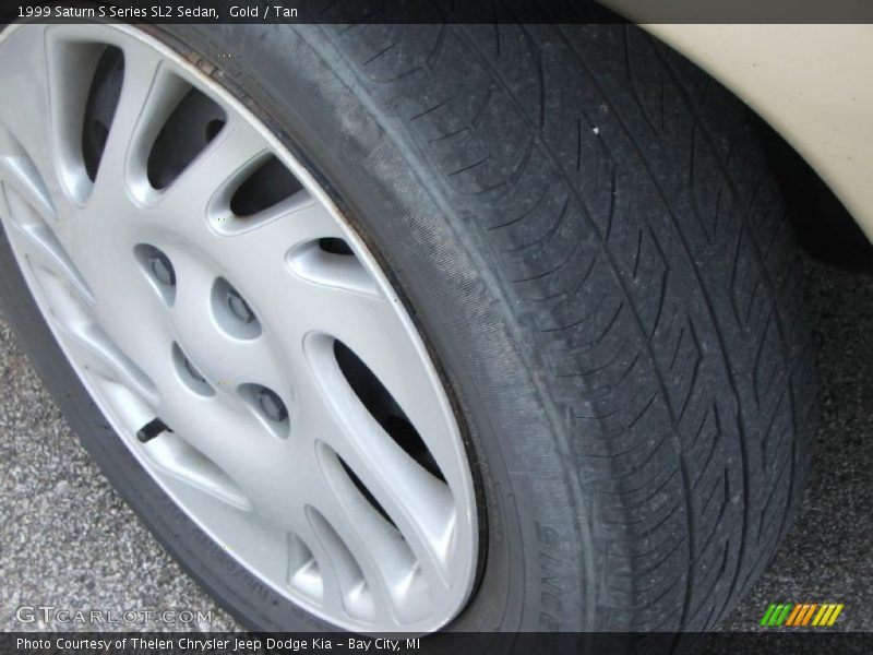 Gold / Tan 1999 Saturn S Series SL2 Sedan