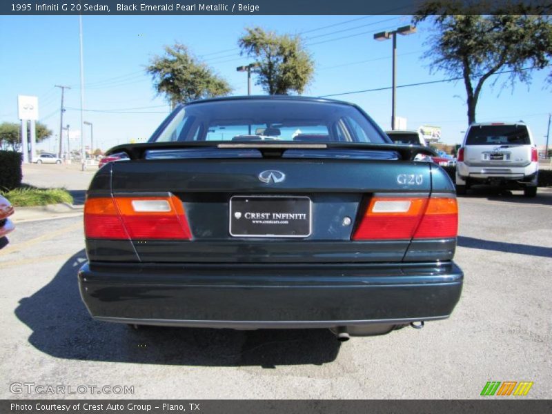 Black Emerald Pearl Metallic / Beige 1995 Infiniti G 20 Sedan