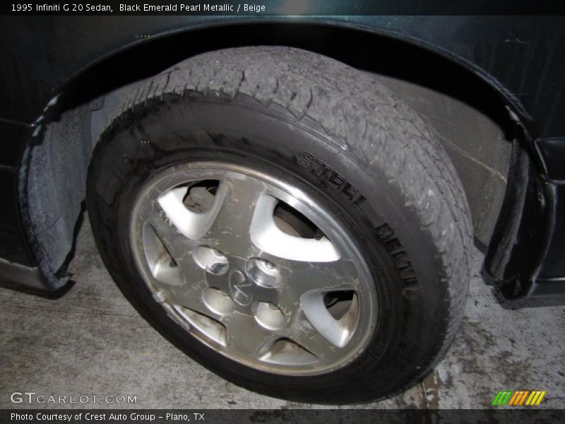 Black Emerald Pearl Metallic / Beige 1995 Infiniti G 20 Sedan