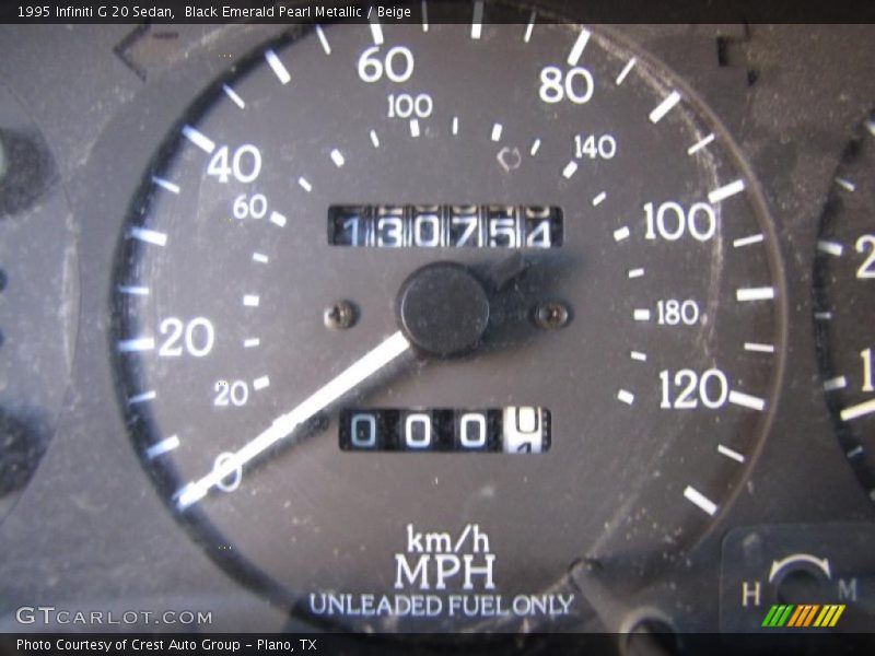 Black Emerald Pearl Metallic / Beige 1995 Infiniti G 20 Sedan