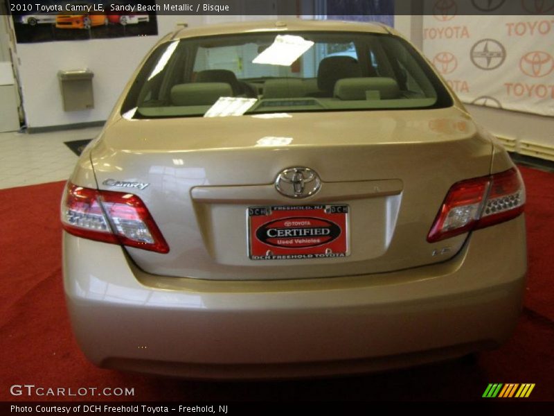Sandy Beach Metallic / Bisque 2010 Toyota Camry LE