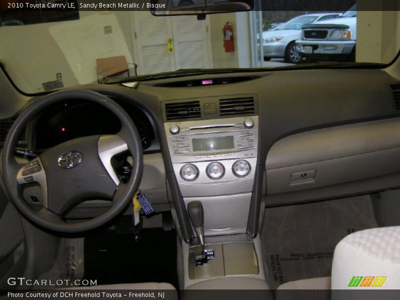 Sandy Beach Metallic / Bisque 2010 Toyota Camry LE