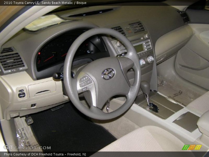 Sandy Beach Metallic / Bisque 2010 Toyota Camry LE