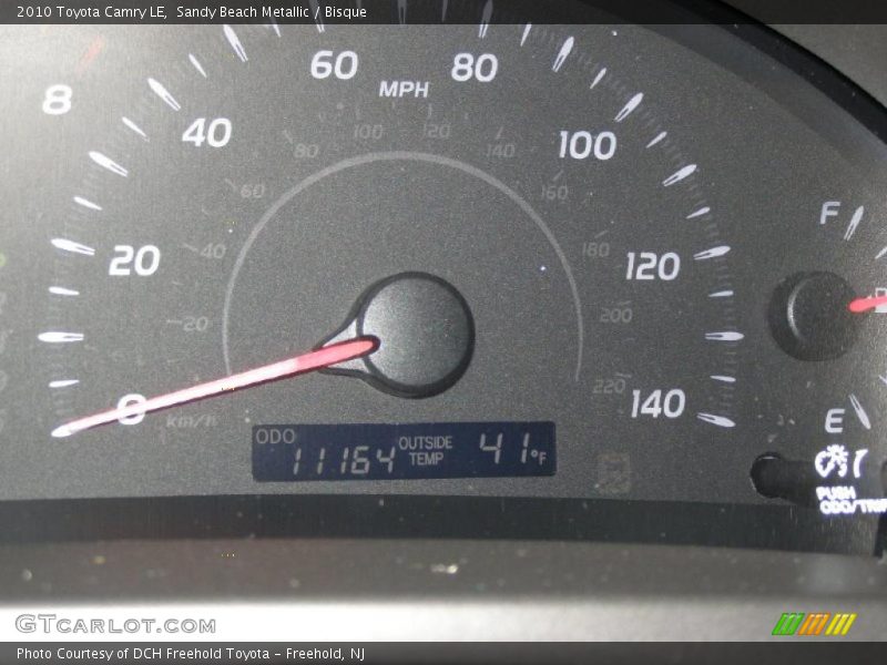 Sandy Beach Metallic / Bisque 2010 Toyota Camry LE