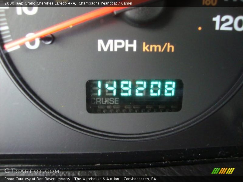 Champagne Pearlcoat / Camel 2000 Jeep Grand Cherokee Laredo 4x4