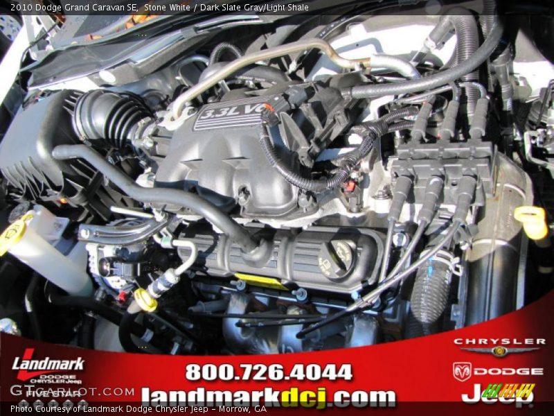 Stone White / Dark Slate Gray/Light Shale 2010 Dodge Grand Caravan SE