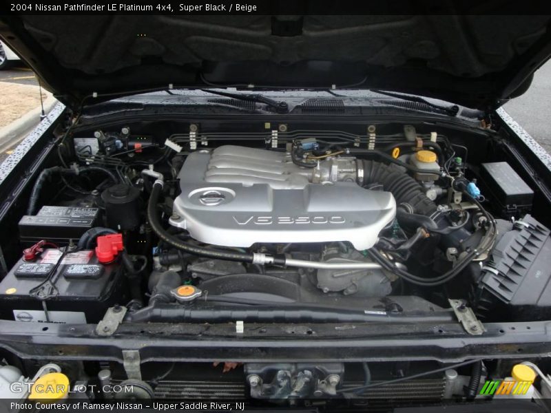Super Black / Beige 2004 Nissan Pathfinder LE Platinum 4x4