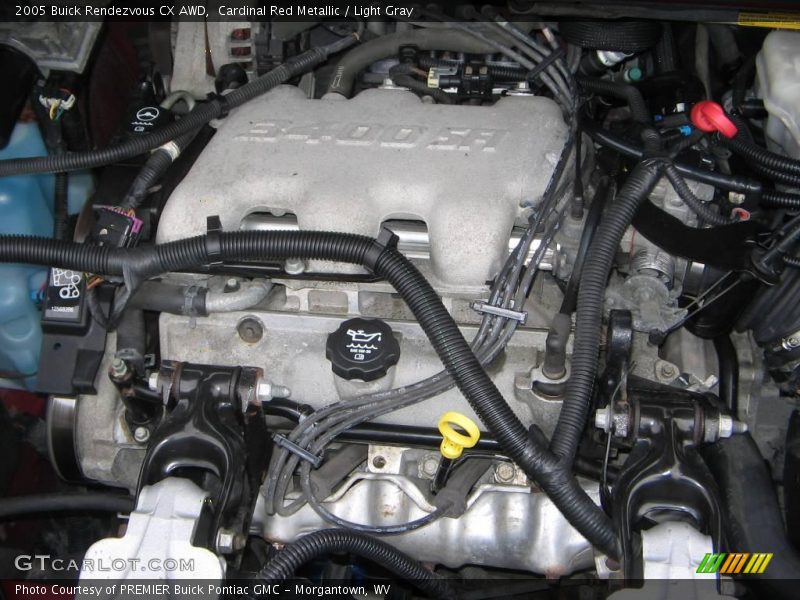 Cardinal Red Metallic / Light Gray 2005 Buick Rendezvous CX AWD