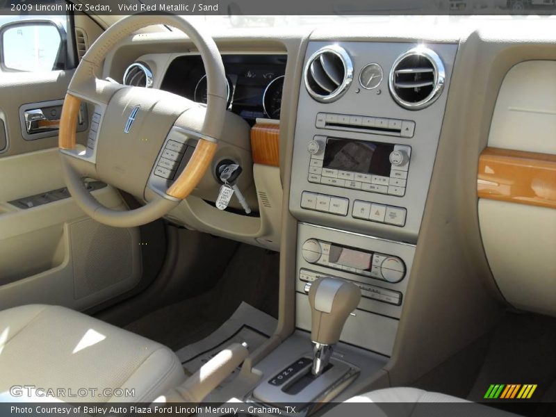 Vivid Red Metallic / Sand 2009 Lincoln MKZ Sedan