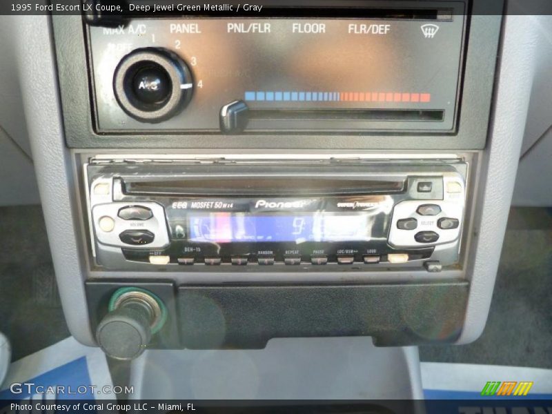 Deep Jewel Green Metallic / Gray 1995 Ford Escort LX Coupe