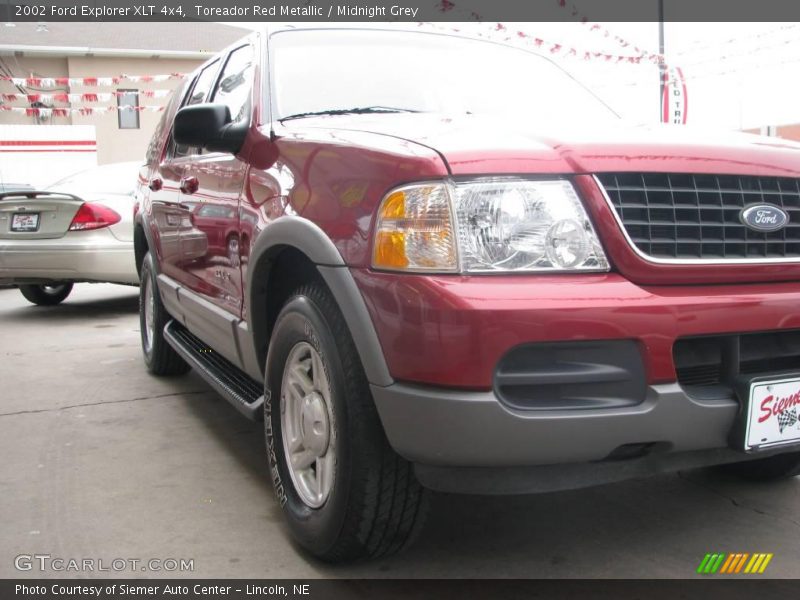 Toreador Red Metallic / Midnight Grey 2002 Ford Explorer XLT 4x4