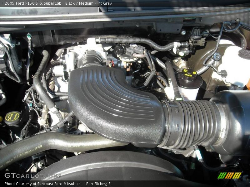 Black / Medium Flint Grey 2005 Ford F150 STX SuperCab