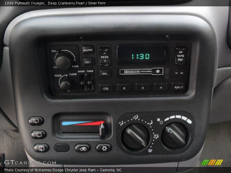 Deep Cranberry Pearl / Silver Fern 1999 Plymouth Voyager