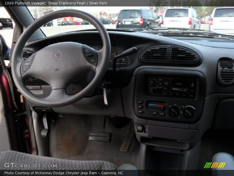 Deep Cranberry Pearl / Silver Fern 1999 Plymouth Voyager