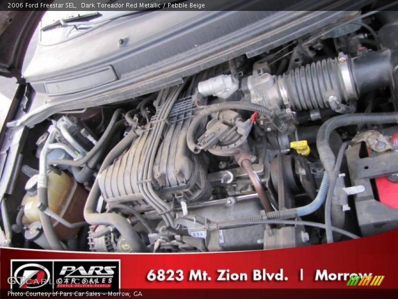 Dark Toreador Red Metallic / Pebble Beige 2006 Ford Freestar SEL
