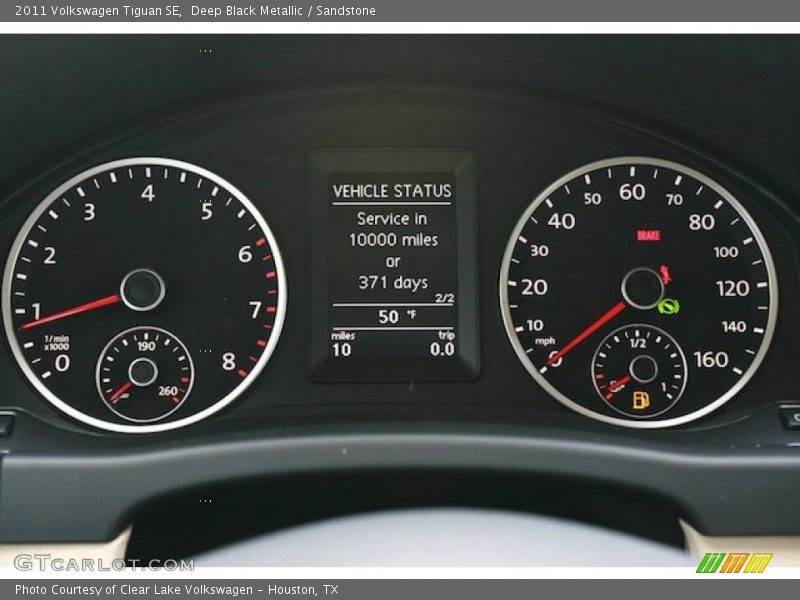 Deep Black Metallic / Sandstone 2011 Volkswagen Tiguan SE