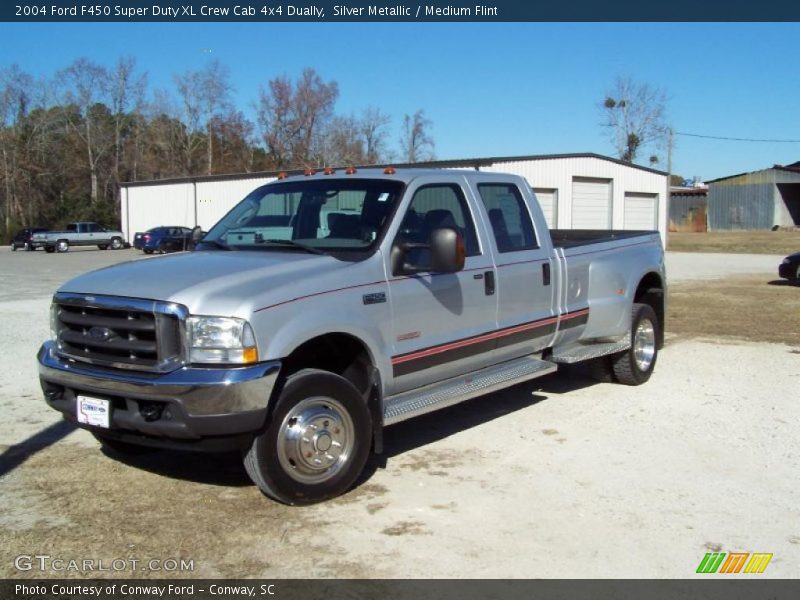 Front 3/4 View of 2004 F450 Super Duty XL Crew Cab 4x4 Dually
