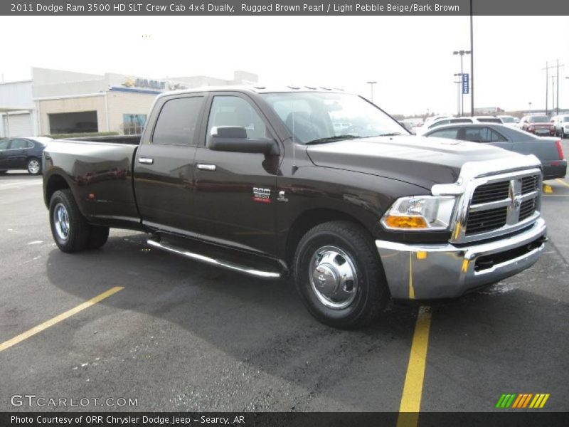 Front 3/4 View of 2011 Ram 3500 HD SLT Crew Cab 4x4 Dually