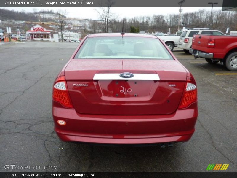 Sangria Red Metallic / Camel 2010 Ford Fusion SEL