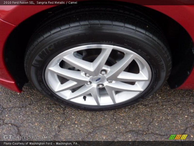 Sangria Red Metallic / Camel 2010 Ford Fusion SEL