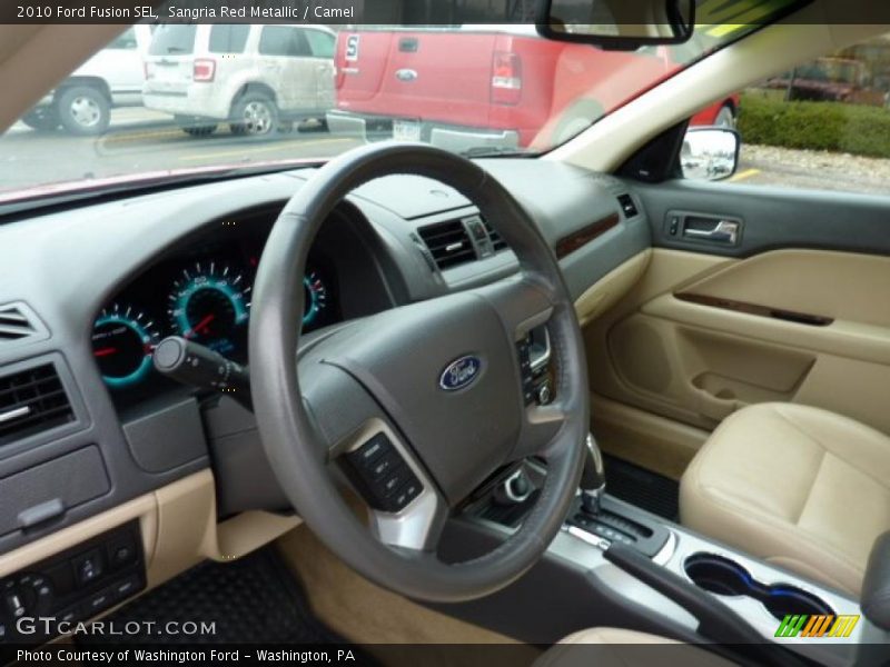 Sangria Red Metallic / Camel 2010 Ford Fusion SEL