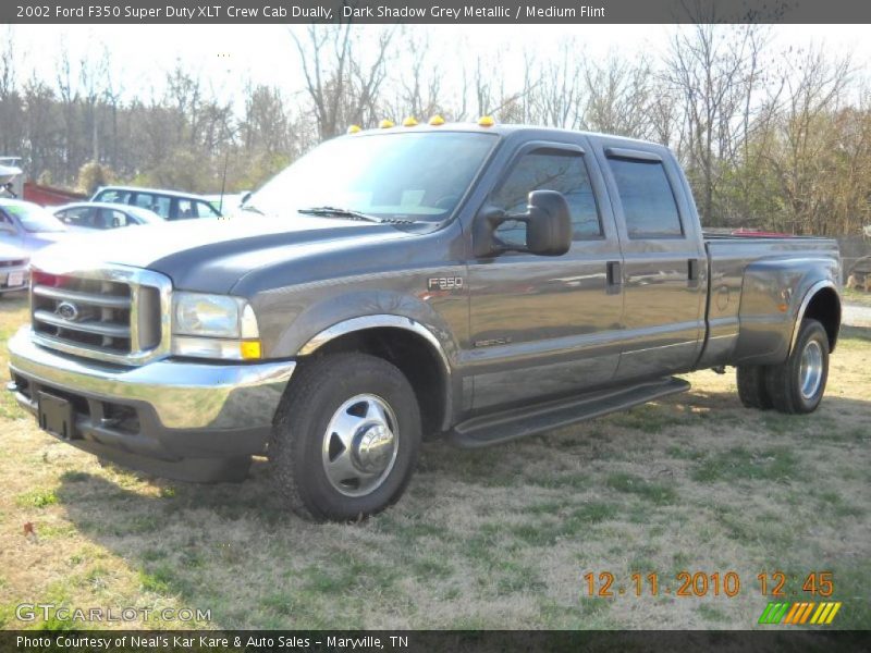 Front 3/4 View of 2002 F350 Super Duty XLT Crew Cab Dually