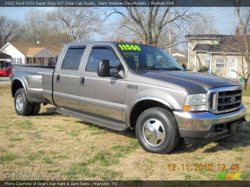 Front 3/4 View of 2002 F350 Super Duty XLT Crew Cab Dually