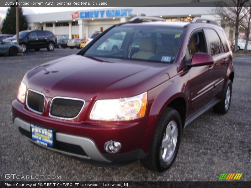 Sonoma Red Metallic / Sand 2009 Pontiac Torrent AWD
