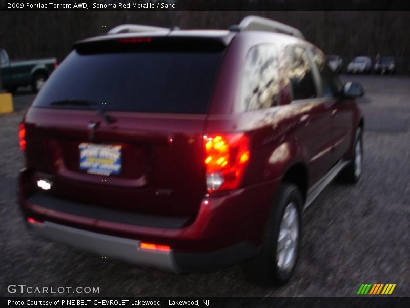 Sonoma Red Metallic / Sand 2009 Pontiac Torrent AWD