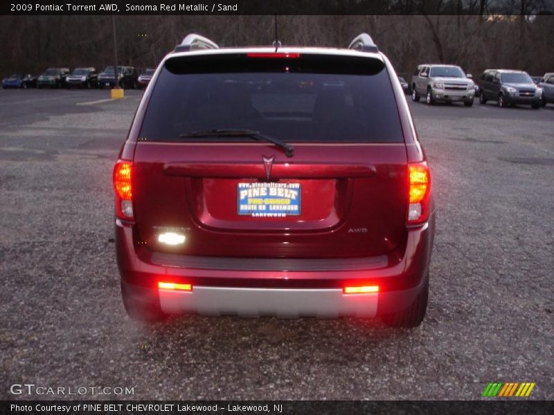 Sonoma Red Metallic / Sand 2009 Pontiac Torrent AWD