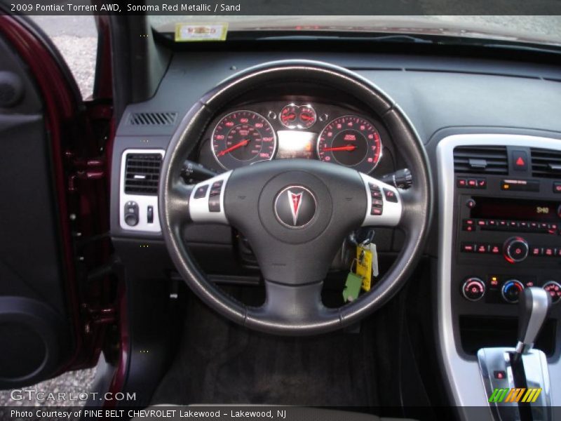 Sonoma Red Metallic / Sand 2009 Pontiac Torrent AWD