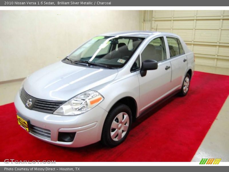 Brilliant Silver Metallic / Charcoal 2010 Nissan Versa 1.6 Sedan