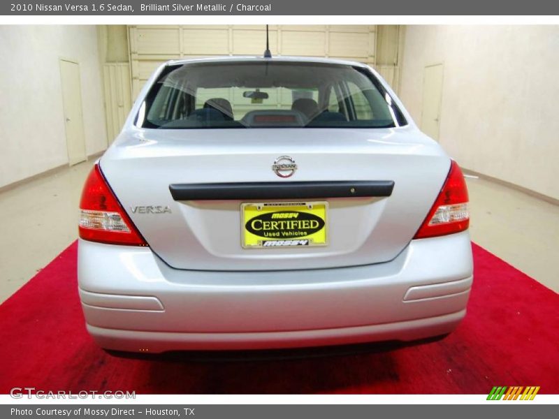 Brilliant Silver Metallic / Charcoal 2010 Nissan Versa 1.6 Sedan