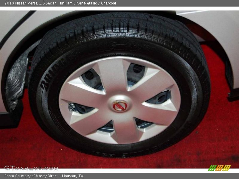 Brilliant Silver Metallic / Charcoal 2010 Nissan Versa 1.6 Sedan