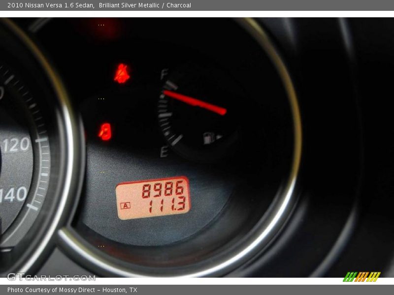 Brilliant Silver Metallic / Charcoal 2010 Nissan Versa 1.6 Sedan
