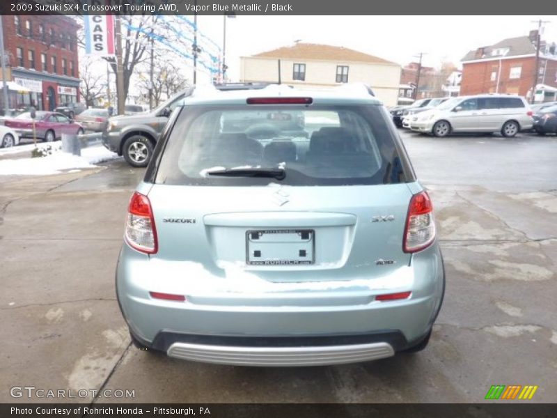 Vapor Blue Metallic / Black 2009 Suzuki SX4 Crossover Touring AWD