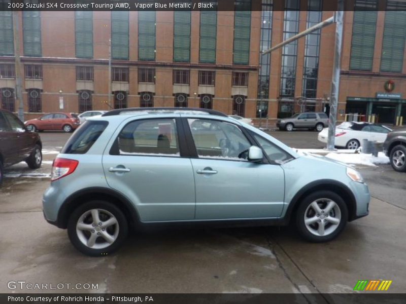  2009 SX4 Crossover Touring AWD Vapor Blue Metallic