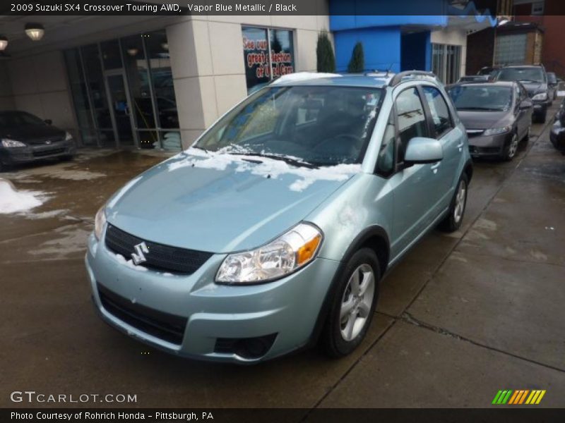 Front 3/4 View of 2009 SX4 Crossover Touring AWD