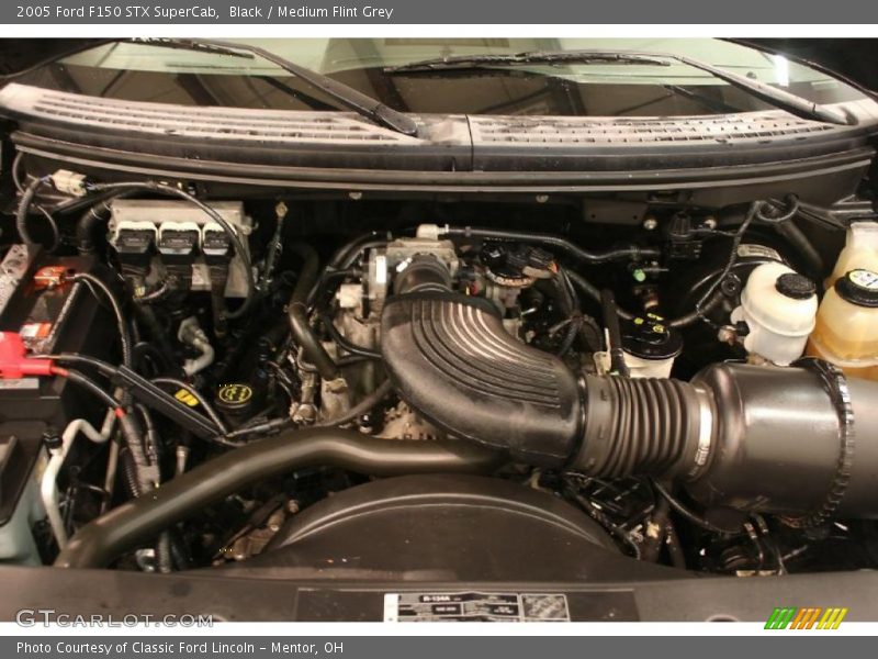 Black / Medium Flint Grey 2005 Ford F150 STX SuperCab