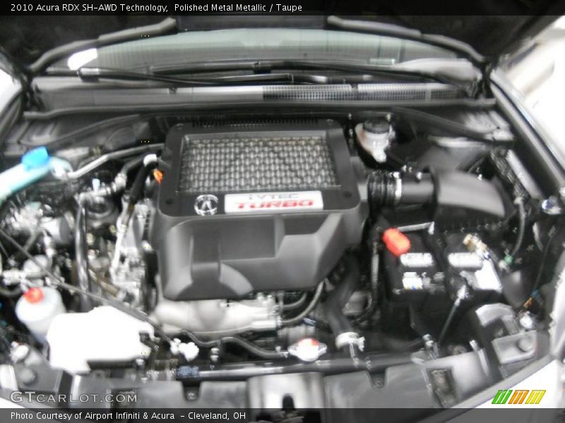 Polished Metal Metallic / Taupe 2010 Acura RDX SH-AWD Technology