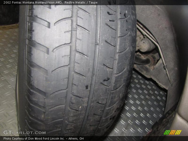 Redfire Metallic / Taupe 2002 Pontiac Montana MontanaVision AWD