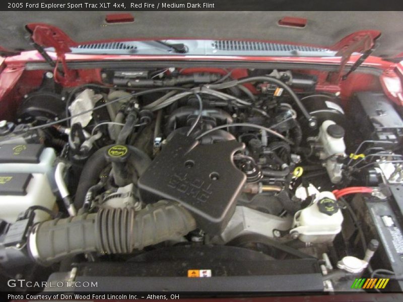 Red Fire / Medium Dark Flint 2005 Ford Explorer Sport Trac XLT 4x4
