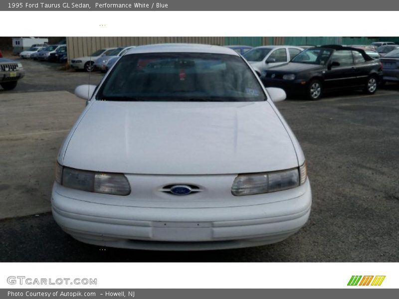 Performance White / Blue 1995 Ford Taurus GL Sedan