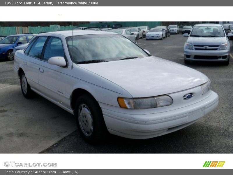 Performance White / Blue 1995 Ford Taurus GL Sedan