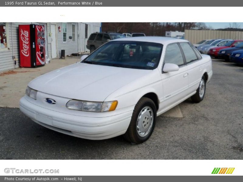 Performance White / Blue 1995 Ford Taurus GL Sedan