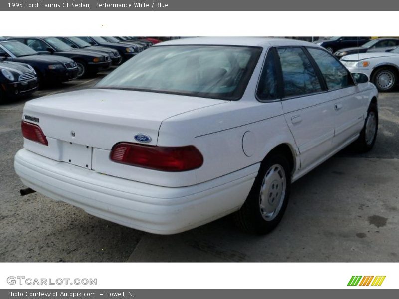 Performance White / Blue 1995 Ford Taurus GL Sedan